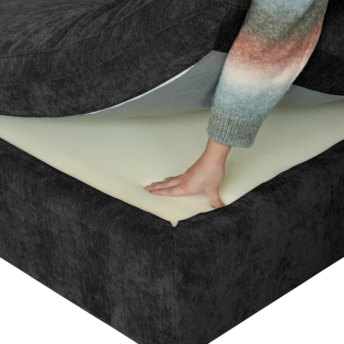 Foam inside the seat cushion of a black Deluxe Cloud sofa
