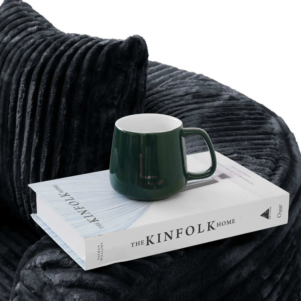 Sofás Essential Round Boneless | Sofá individual de una plaza, de tela afelpada, color negro