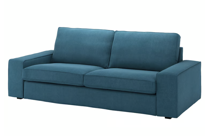 una imagen de un sofá cama azul de IKEA